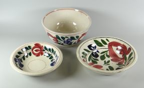 THREE ITEMS OF LLANELLY 'PERSIAN ROSE' DECORATED ITEMS comprising footed bowl and two dishes, bowl