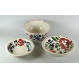 THREE ITEMS OF LLANELLY 'PERSIAN ROSE' DECORATED ITEMS comprising footed bowl and two dishes, bowl