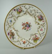 A FINE NANTGARW PORCELAIN PLATE London decorated, to the border with four wicker baskets overflowing