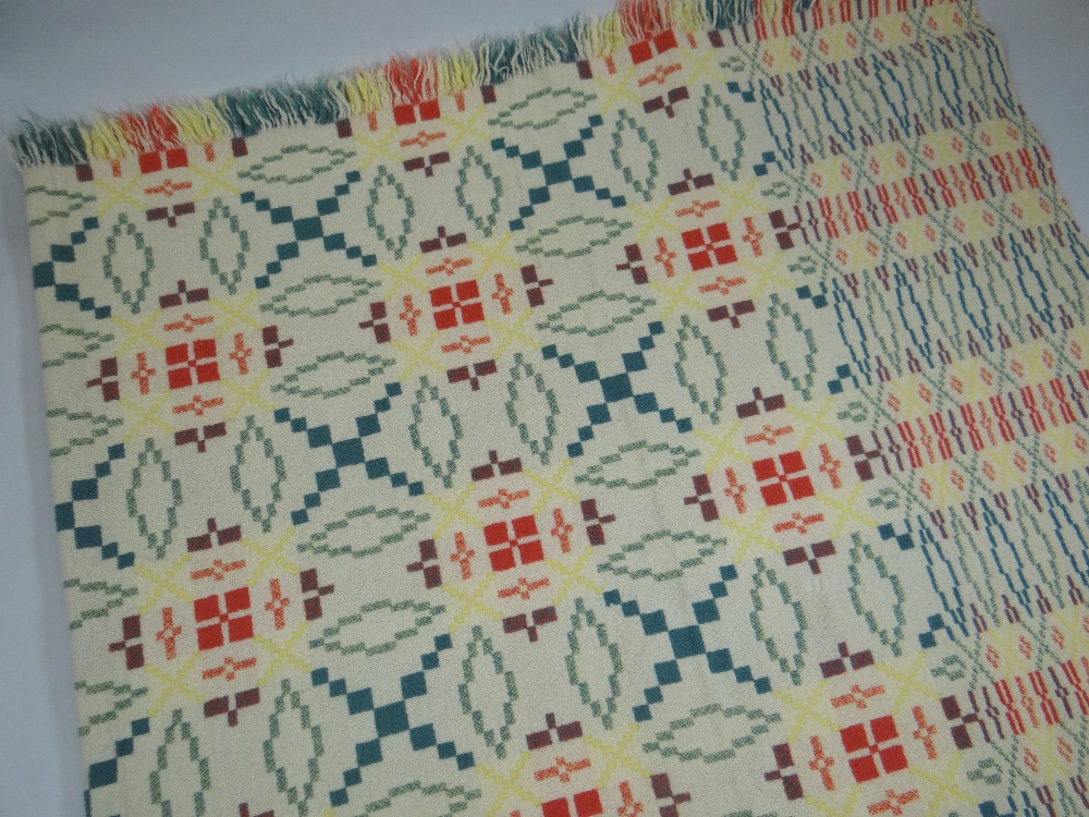 A WELSH BLANKET in geometric solid green, green flecked, yellow and red patterning, 205 x 145cms - Image 2 of 2