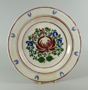 A SWANSEA DILLWYN PERIOD EARTHENWARE PLATE with raised fern and acanthus border, the interior enamel