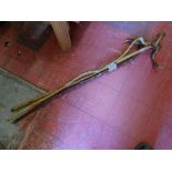 Parcel of three walking sticks with shaped handles