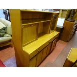 Mid Century Nathan lounge unit with single glazed door over three drawers, three base cupboards