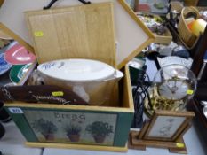 Vintage style bread bin and lid, a Kundo anniversary clock under a glass dome, a souvenir