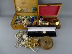Two vintage mahogany lidded boxes and contents including a Scottish brooch and other jewellery etc