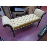 Vintage upholstered stool with scrolled ends and tapered supports