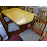 Excellent G-Plan extending dining table with six (four plus two) dining chairs