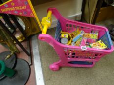 Toddler's shopping trolley with toy contents