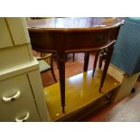 Light wood two tier coffee table and a small demi-lune hall table with drawer on reeded supports
