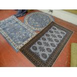 Circular Murat rug by Mastercraft rugs, an oblong rug and a Bagdad rug