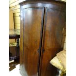 Two door corner cabinet with interior shelf