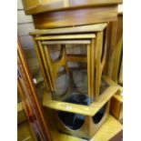 Hexagonal glass topped occasional table and a nest of three mid Century teak tables