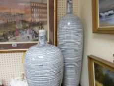 Two contemporary vases, shortest 51 cms high and the tallest 70 cms high