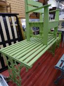 Painted wooden slatted garden table with metal ends and two painted wooden wide garden chairs