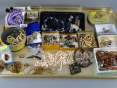 Tray containing large quantity of costume and other jewellery, beads, badges etc