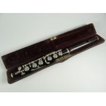 A vintage cased wooden piccolo