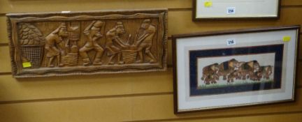 Framed Indian silk panel of elephants together with a naive tribal carving