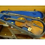 A vintage wooden cased Stradivarius copy violin & two bows