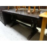 A dark wood refectory-style dining table