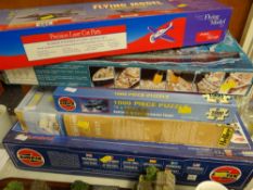 Boxed Airfix model of Concorde, boxed model of the Titanic, jigsaw puzzles