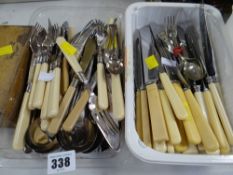 Two boxes of various loose flatware