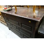 An antique oak large coffer