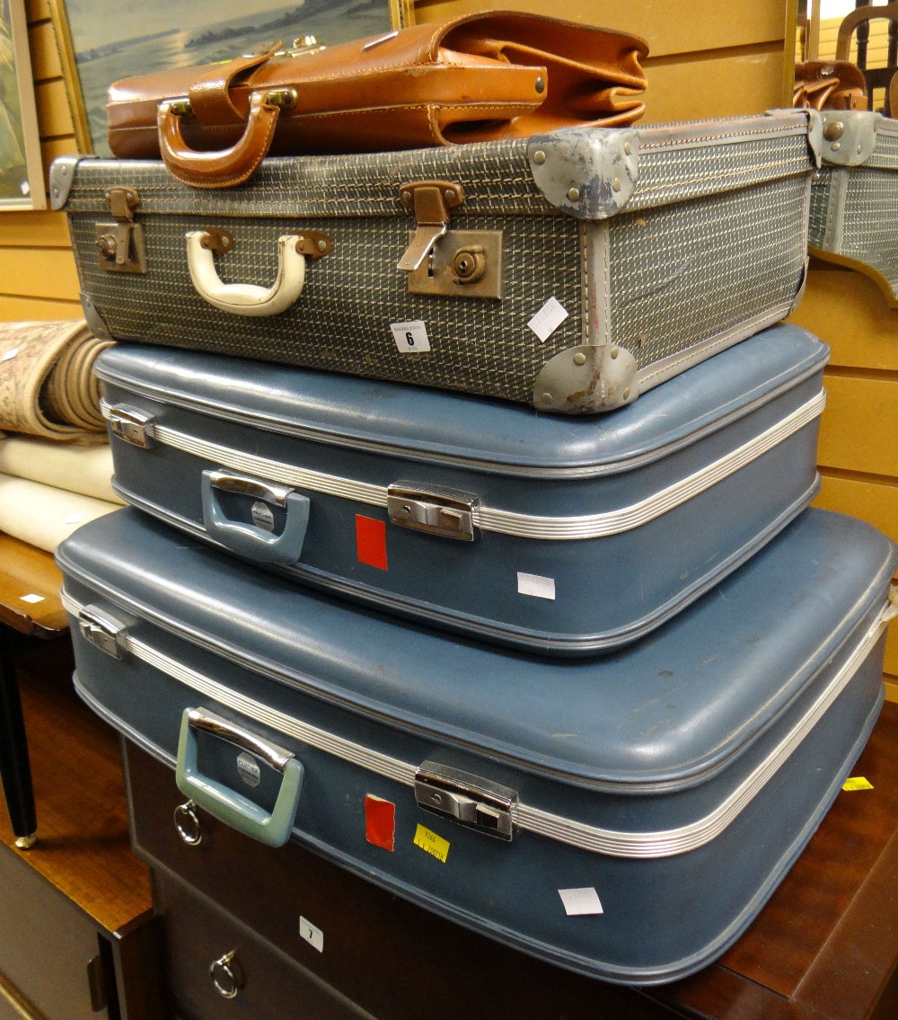 Parcel of vintage suitcases together with a good leather briefcase