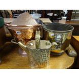 A copper coal scuttle, brass coal bucket with lion head handles & a brass watering can