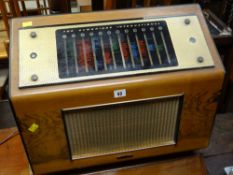 A vintage Pye 'The Cambridge International Radio' in walnut case