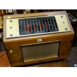 A vintage Pye 'The Cambridge International Radio' in walnut case