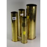 Four brass artillery shells