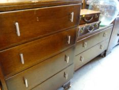 A vintage Deco-style oak mirrored dressing table & chest of four drawers