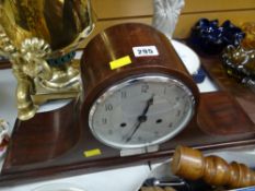 An early twentieth century mahogany Napoleon's hat mantel clock by Enfield with hallmarked silver