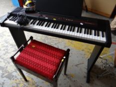 A Roland EP-77 electric piano together with piano stool