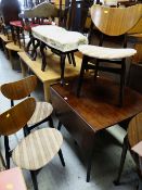 A vintage G-Plan dark wood drop leaf dining table together with four matching butterfly chairs