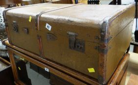 A vintage banded suitcase