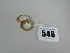 A 22ct wedding band together with an 18k ring, 5.9grms total weight