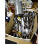A box of stainless steel flatware, pewter tankard etc