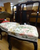 A pair of Edwardian high back salon chairs with recent upholstery