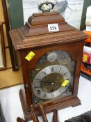 An Elliott Regency-style mahogany cased bracket clock with Westminster chime / strike mechanism