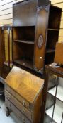 A neat vintage oak drop down bureau on raised ball & claw feet together with a small narrow oak