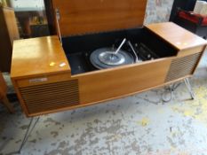 A teak Deccalian 12 vintage radiogram with a Garrard turntable together with a cabinet of LP
