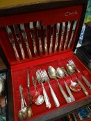 A wooden cased set of Oneida cutlery