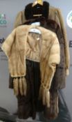 A chocolate brown full length fur coat together with a light fur fringed stole & vintage ladies'