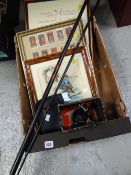 Crate of fishing related items including prints, flies, reel & rod