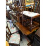 Mid-twentieth century oak pull-out extending dining table with stretcher base & four matching dining