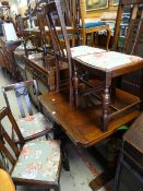 Mid-twentieth century oak pull-out extending dining table with stretcher base & four matching dining