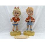 A PAIR OF COMPOSITION ADVERTISING FIGURES FOR FORTES ICES of a young girl and boy standing on