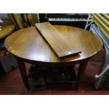 A FRENCH INLAID MAHOGANY EXTENDING DINING TABLE with single additional leaf, on tapering supports