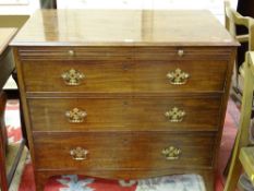 A GEORGE IV MAHOGANY THREE DRAWER BACHELOR'S CHEST with brushing slide, the top drawer stamped '